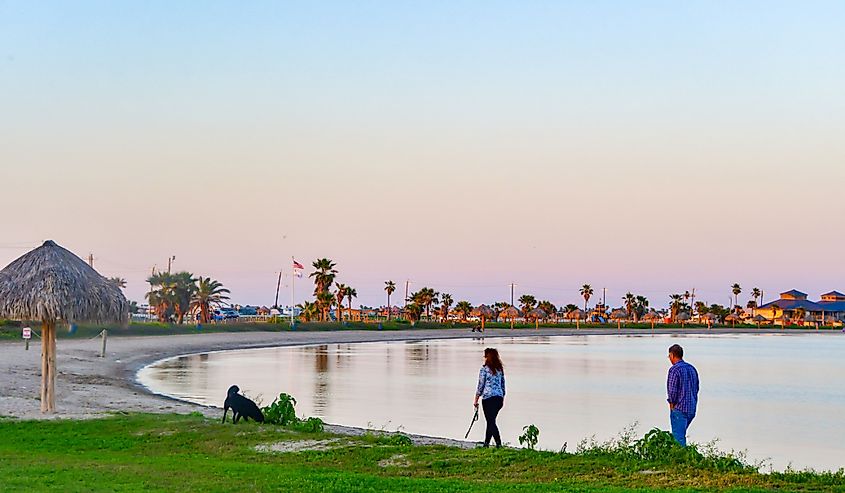 People walking along the beach, Rockport, Texas.